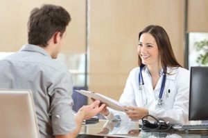 doctor explaining medication-assisted treatment programs virginia