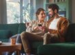 Couple sitting on couch together practicing relationship repair strategies