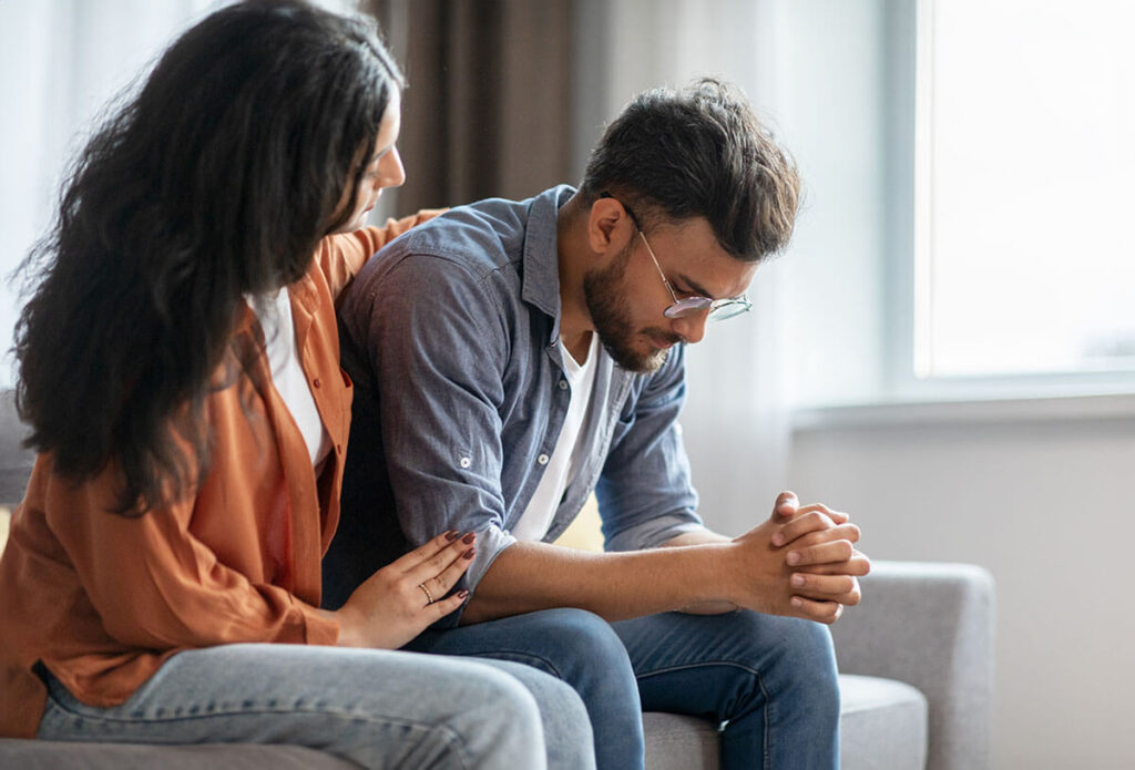 couple talking about how alcohol ruins relationships while trying to repair their bond in therapy